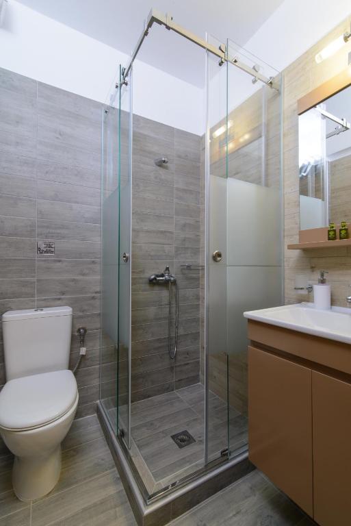 Kúpeľňa v ubytovaní Athos Thea Luxury Rooms