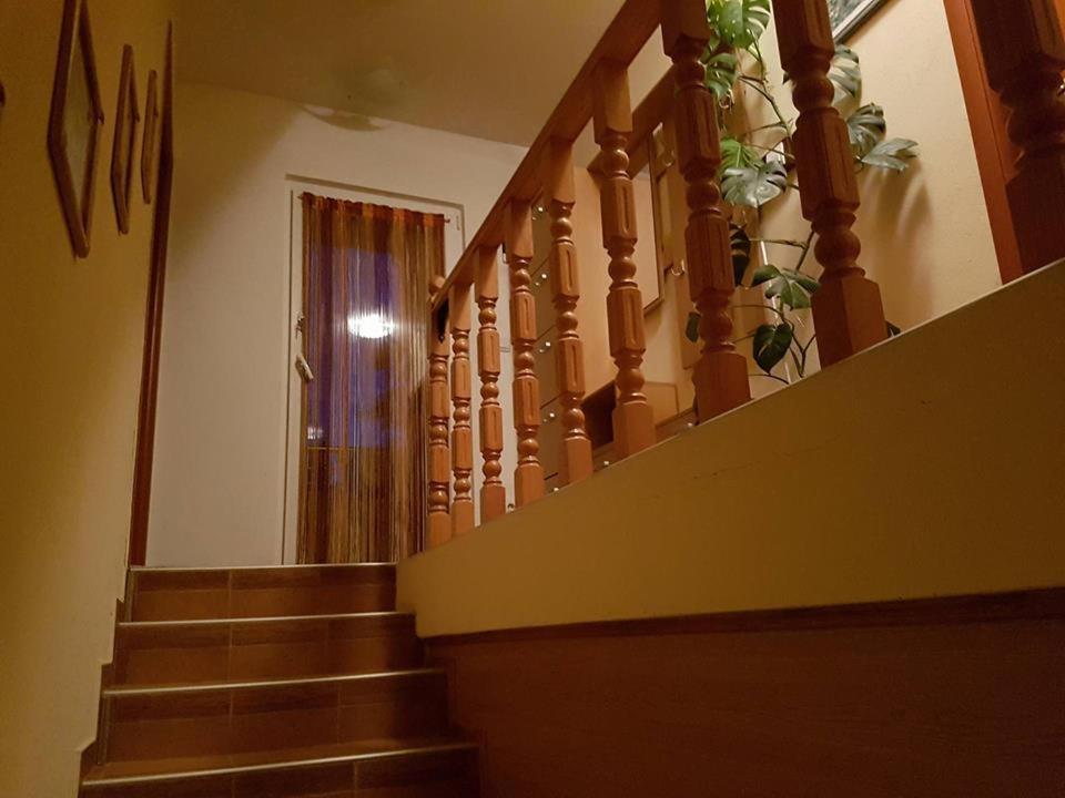 a set of stairs with a door and a window at Apartment Panorama in Kotor