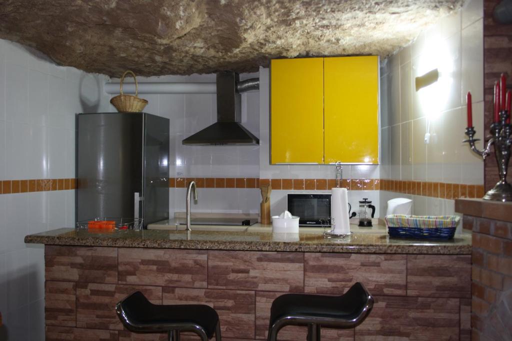 Kuchyň nebo kuchyňský kout v ubytování Cueva Sasha
