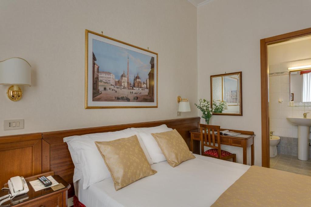 Postel nebo postele na pokoji v ubytování Hotel Silla