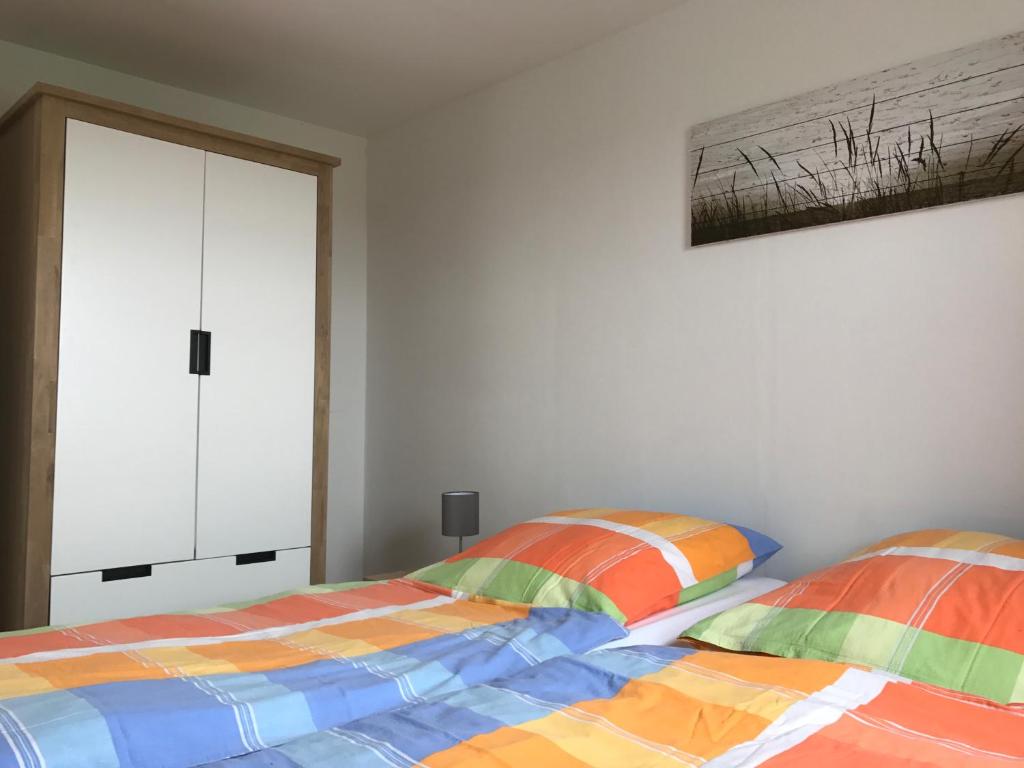 Postel nebo postele na pokoji v ubytování Haus Heverstrom