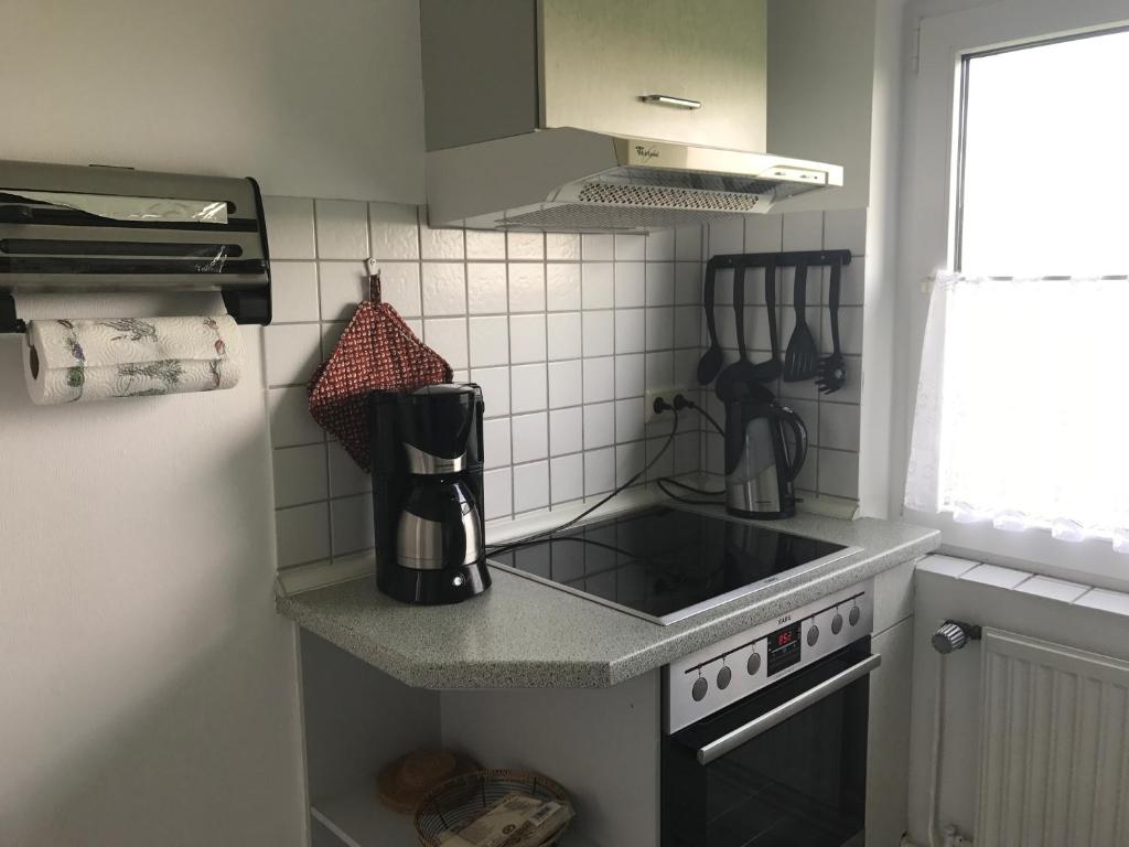 Kuchyň nebo kuchyňský kout v ubytování Haus Heverstrom
