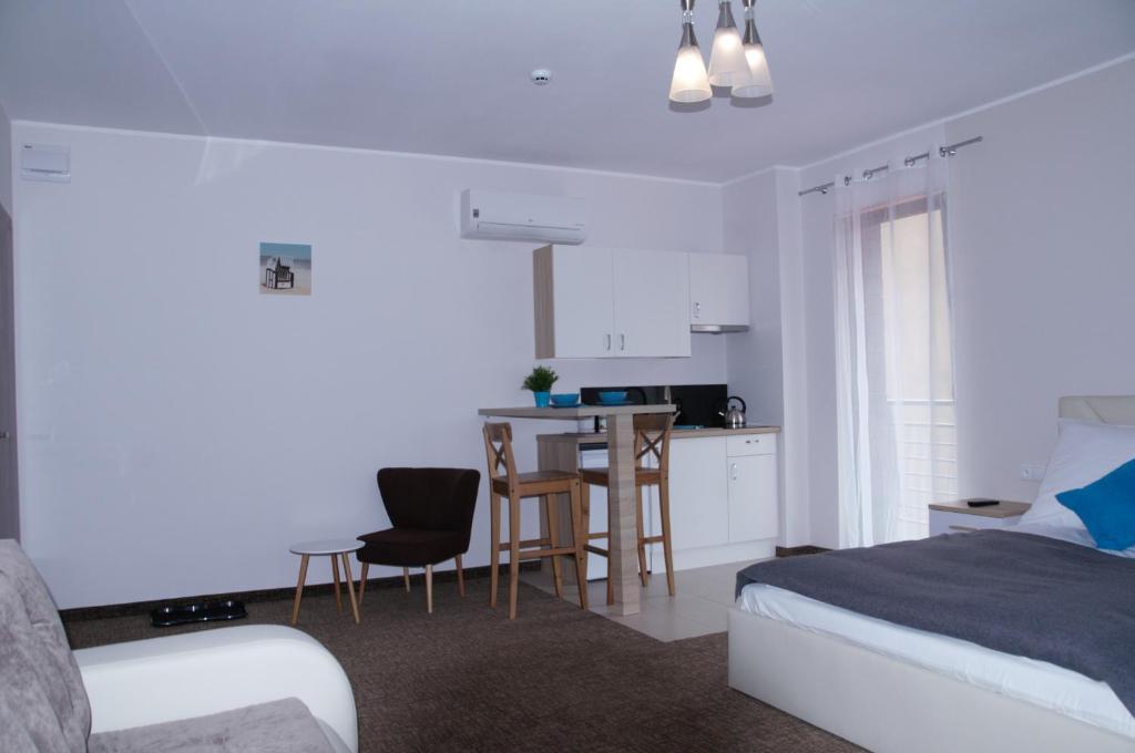 Posteľ alebo postele v izbe v ubytovaní Apartamenty Patria