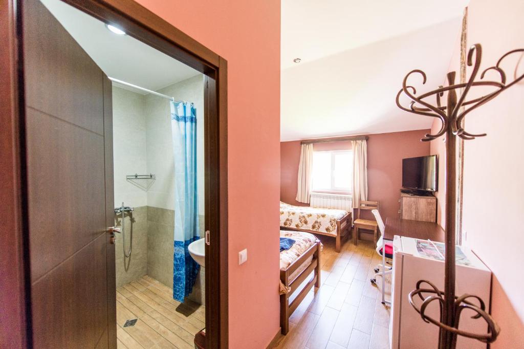 TV a/nebo společenská místnost v ubytování Guest House 15