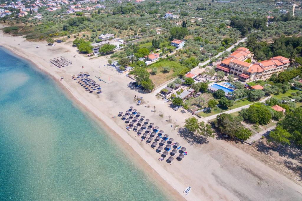 an aerial view of a beach with a resort at Atrium Hotel Thassos in Potos