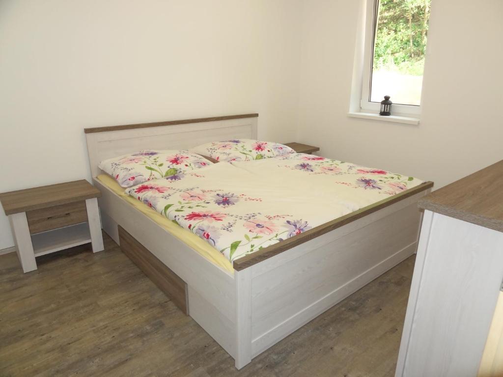 Postel nebo postele na pokoji v ubytování Apartmány Starovice