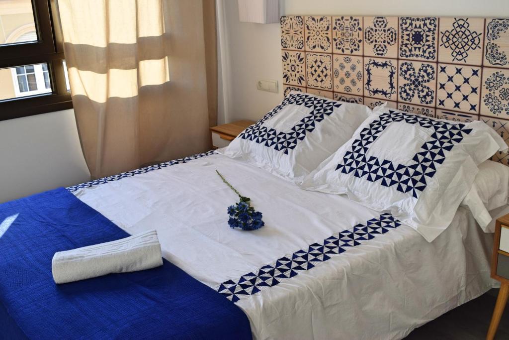 A bed or beds in a room at Apartamento Soho Solo Familias