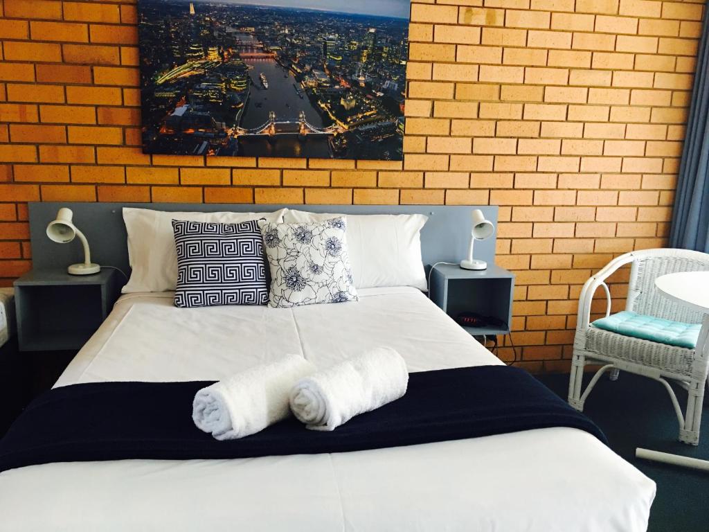 Postel nebo postele na pokoji v ubytování Bosuns Inn Motel