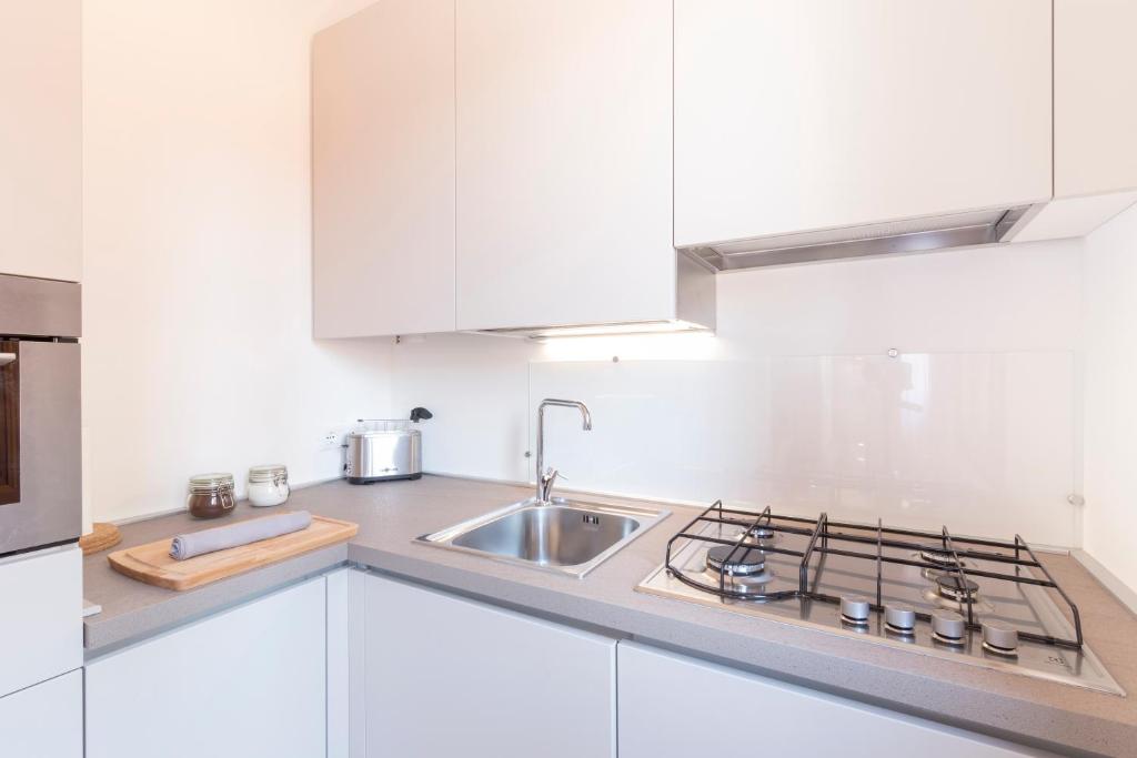 Kuchyňa alebo kuchynka v ubytovaní Residence Giulietta