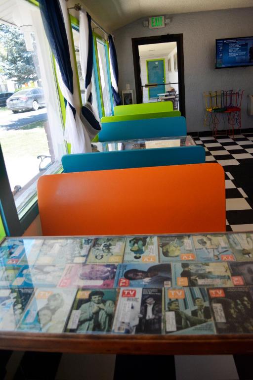 a table and chairs in a bus at Retro Inn at Mesa Verde in Cortez