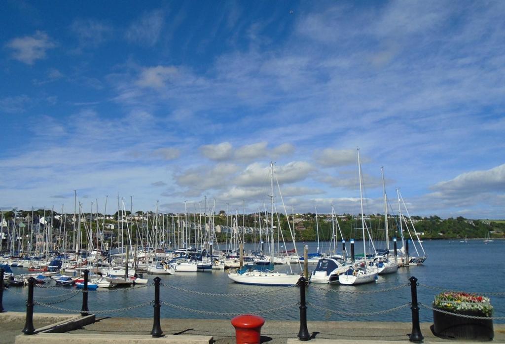 a bunch of boats docked in a harbor at Kinsale Centre Apartment in Kinsale