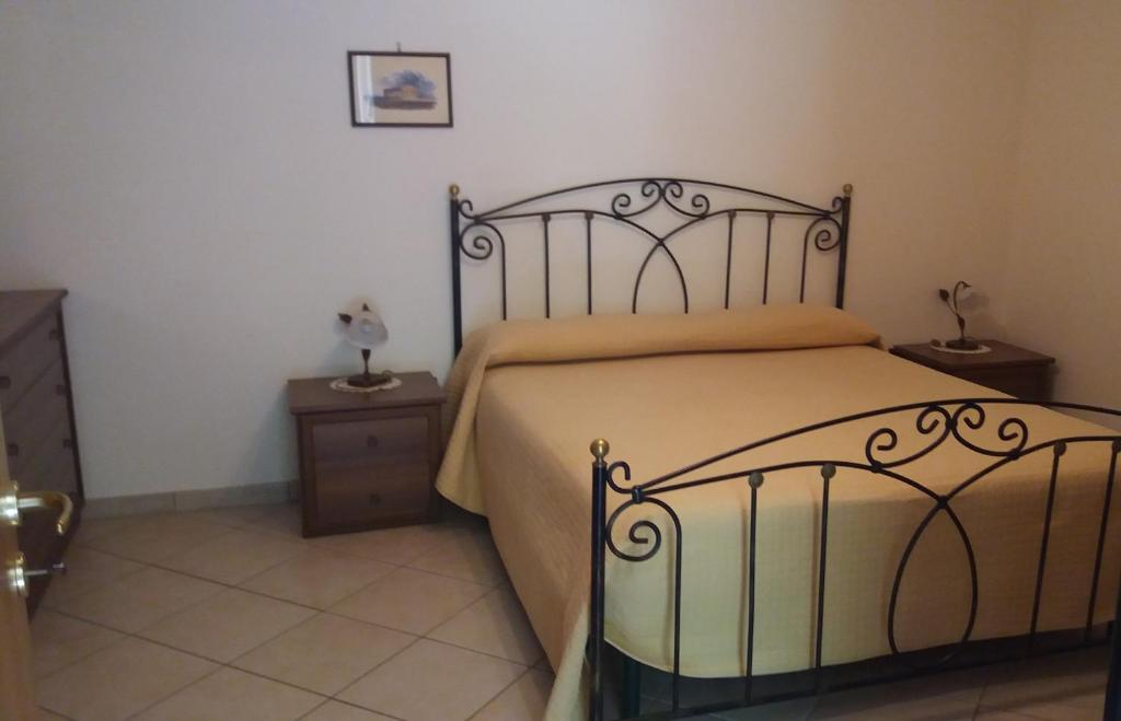 Łóżko lub łóżka w pokoju w obiekcie Agriturismo Costiera Amalfitana