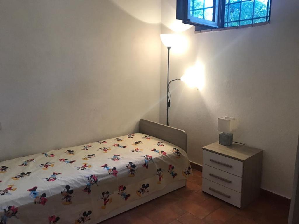 Postel nebo postele na pokoji v ubytování Casa dei Borghi