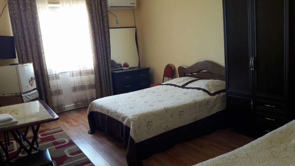 Postel nebo postele na pokoji v ubytování Hotel Lika