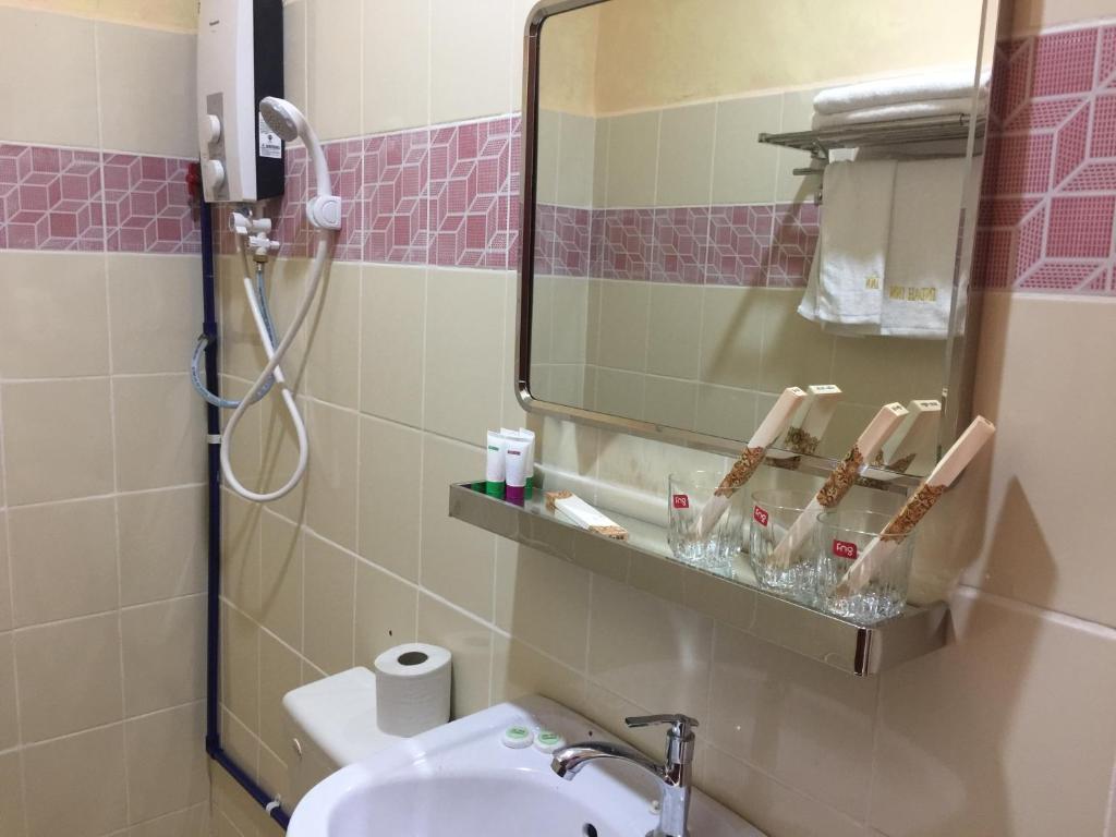 Koupelna v ubytování Indah Inn