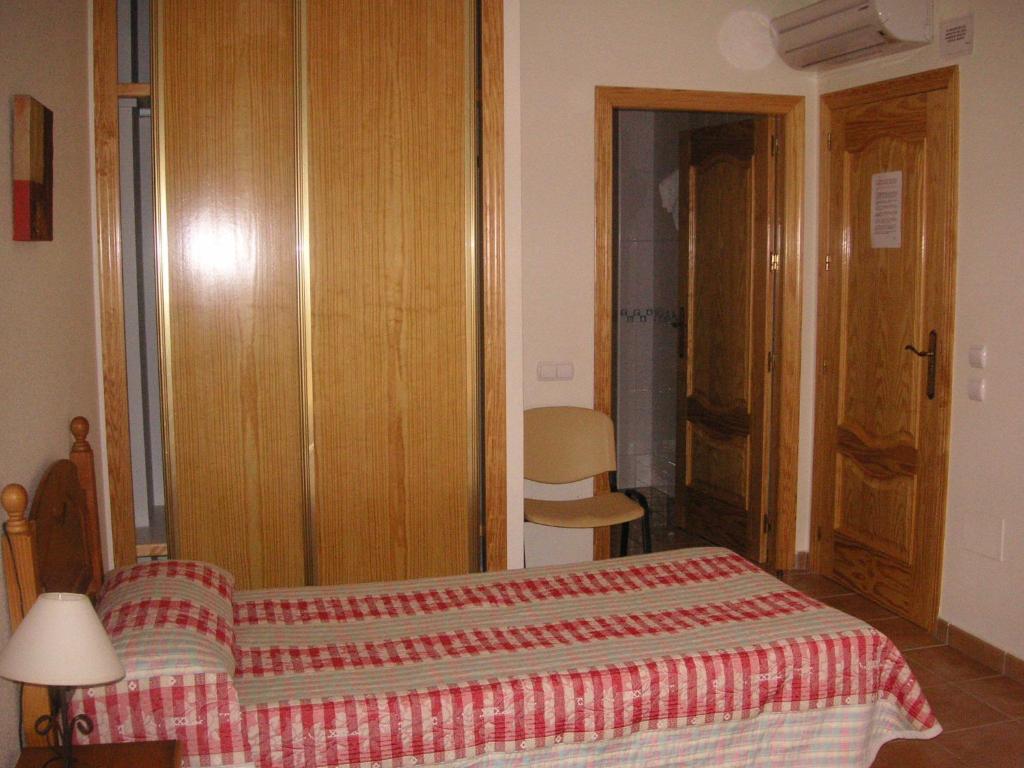 Postel nebo postele na pokoji v ubytování El Cordobés , alojamiento y habitaciones