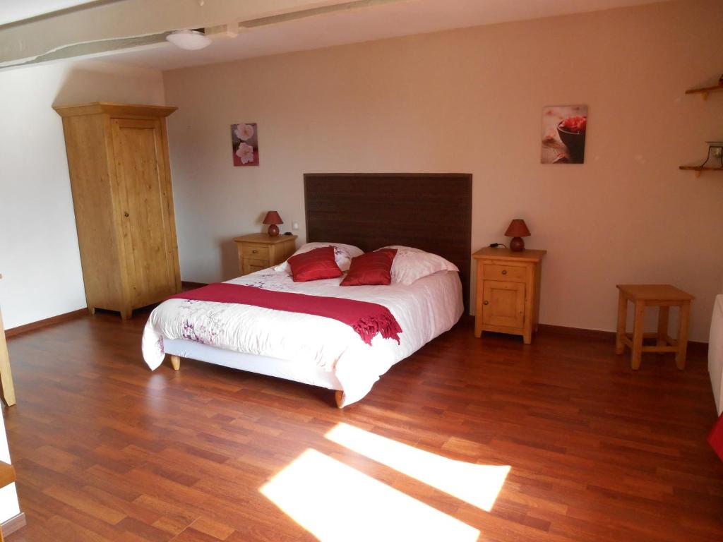 Postel nebo postele na pokoji v ubytování Le Pressoir B&B