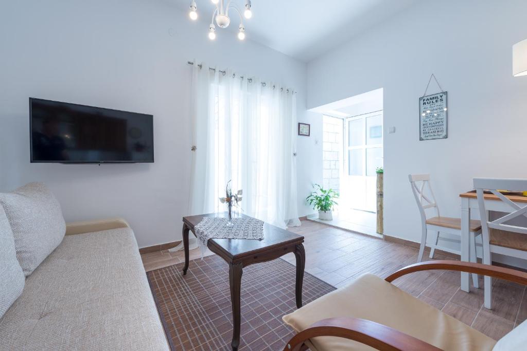 TV a/nebo společenská místnost v ubytování K&L central apartments