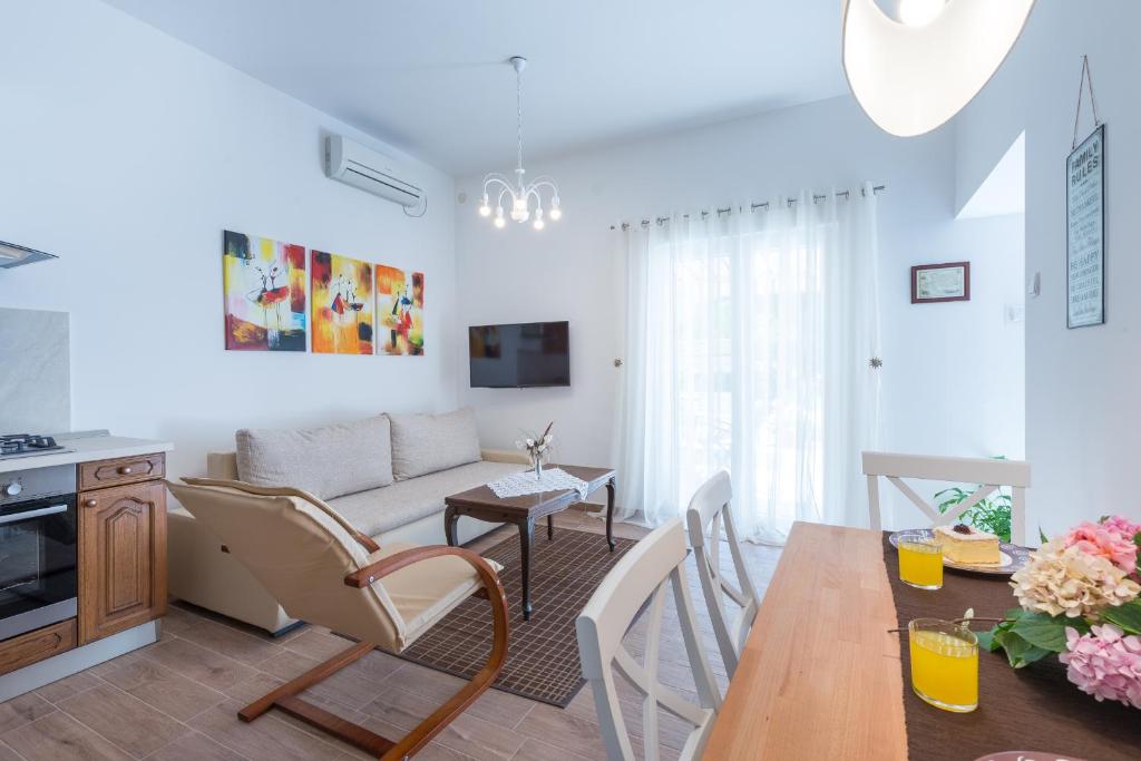 TV a/nebo společenská místnost v ubytování K&L central apartments
