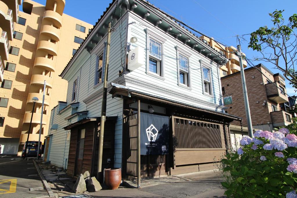 an old building on the corner of a street at Hakodate Classic Hotels in Hakodate