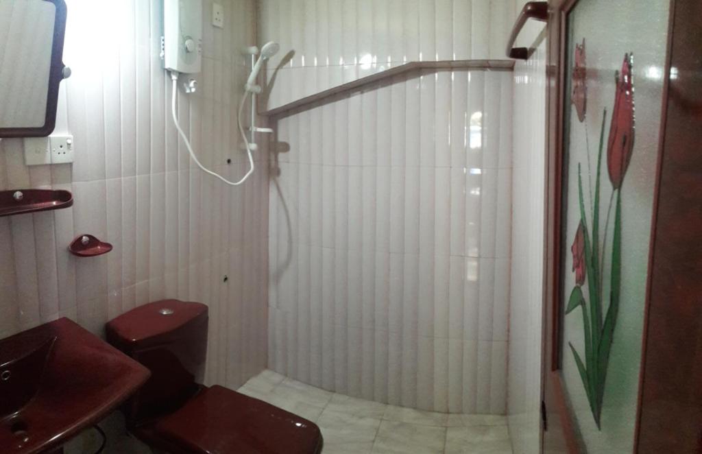 Koupelna v ubytování Apple Sara Home Stay