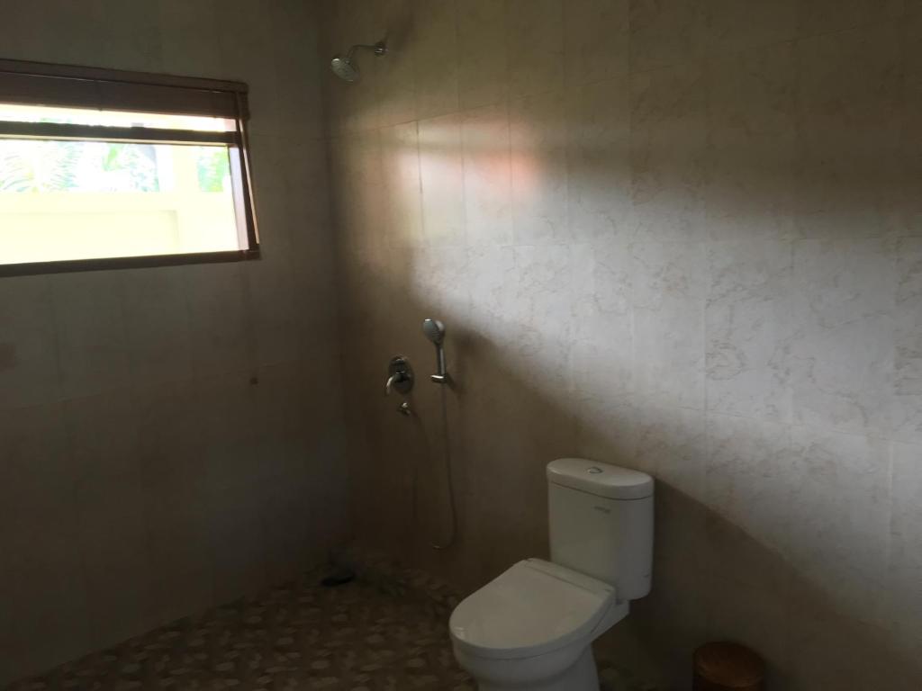 Koupelna v ubytování Raka Rai Bungalows