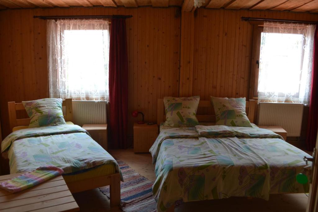 Postel nebo postele na pokoji v ubytování Hotel Zlagoda