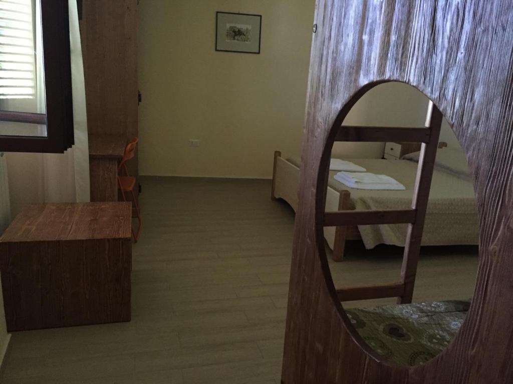 A bed or beds in a room at Le Quattro Stagioni