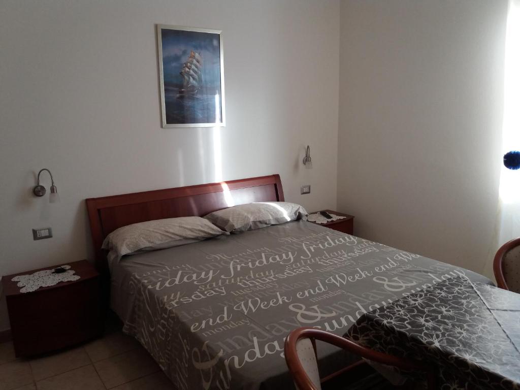Postel nebo postele na pokoji v ubytování White Beach