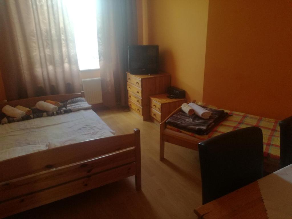Televízia a/alebo spoločenská miestnosť v ubytovaní Restauracja - Hotel Nova