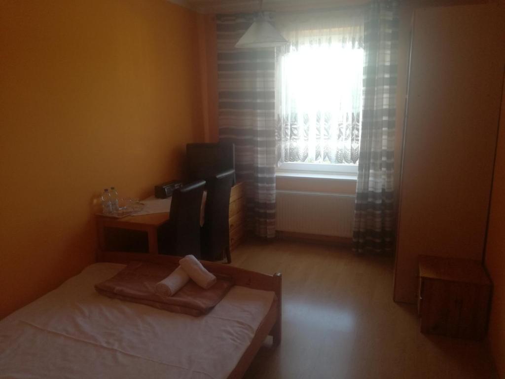 Posteľ alebo postele v izbe v ubytovaní Restauracja - Hotel Nova