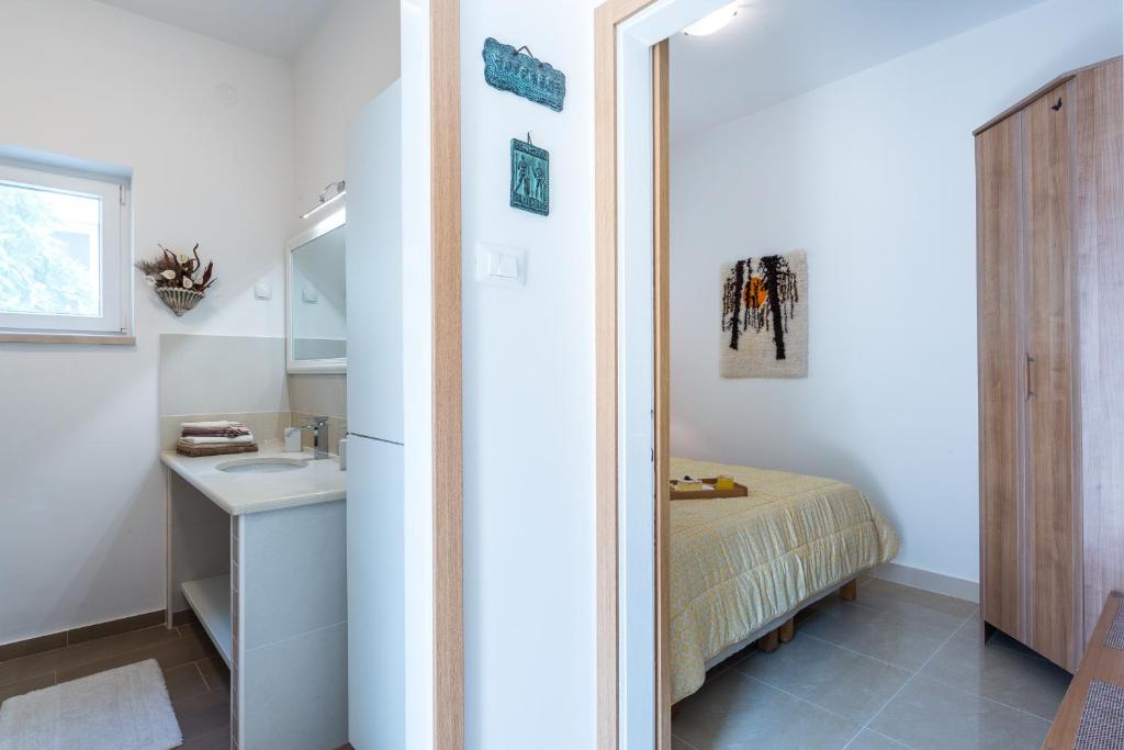 Postel nebo postele na pokoji v ubytování K&L central apartments