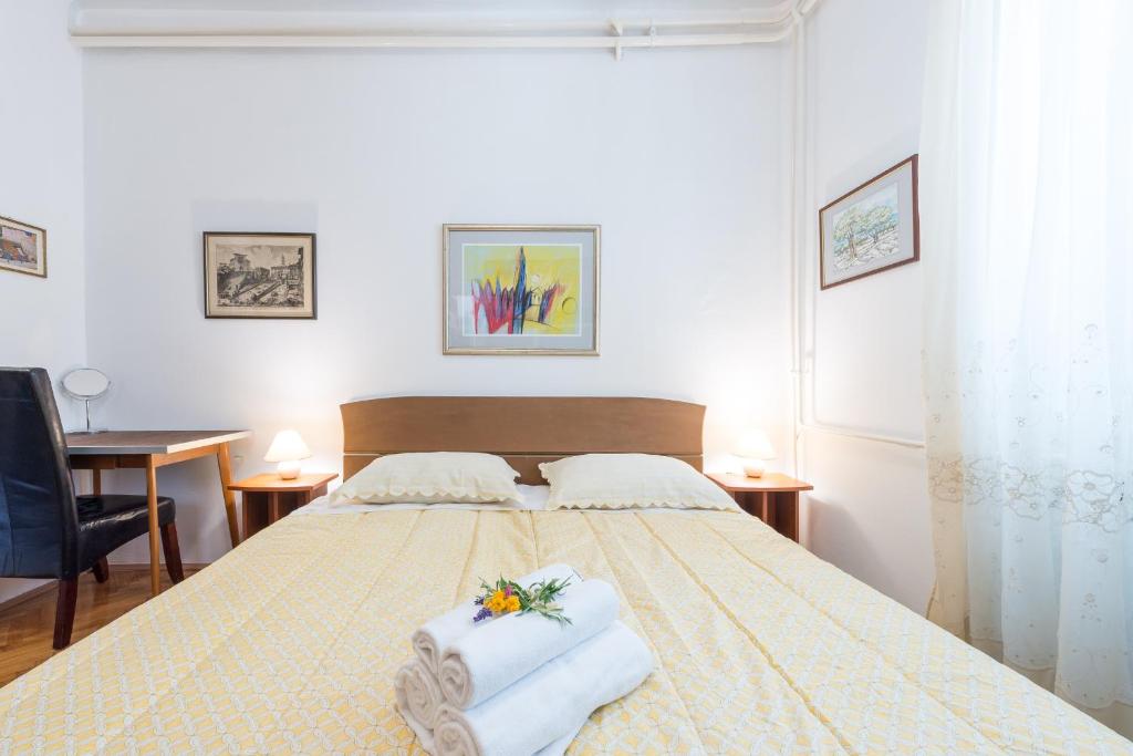 Postel nebo postele na pokoji v ubytování K&L central apartments