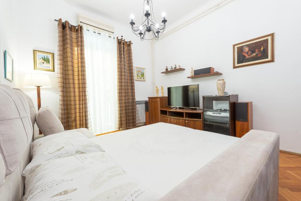 TV a/nebo společenská místnost v ubytování K&L central apartments