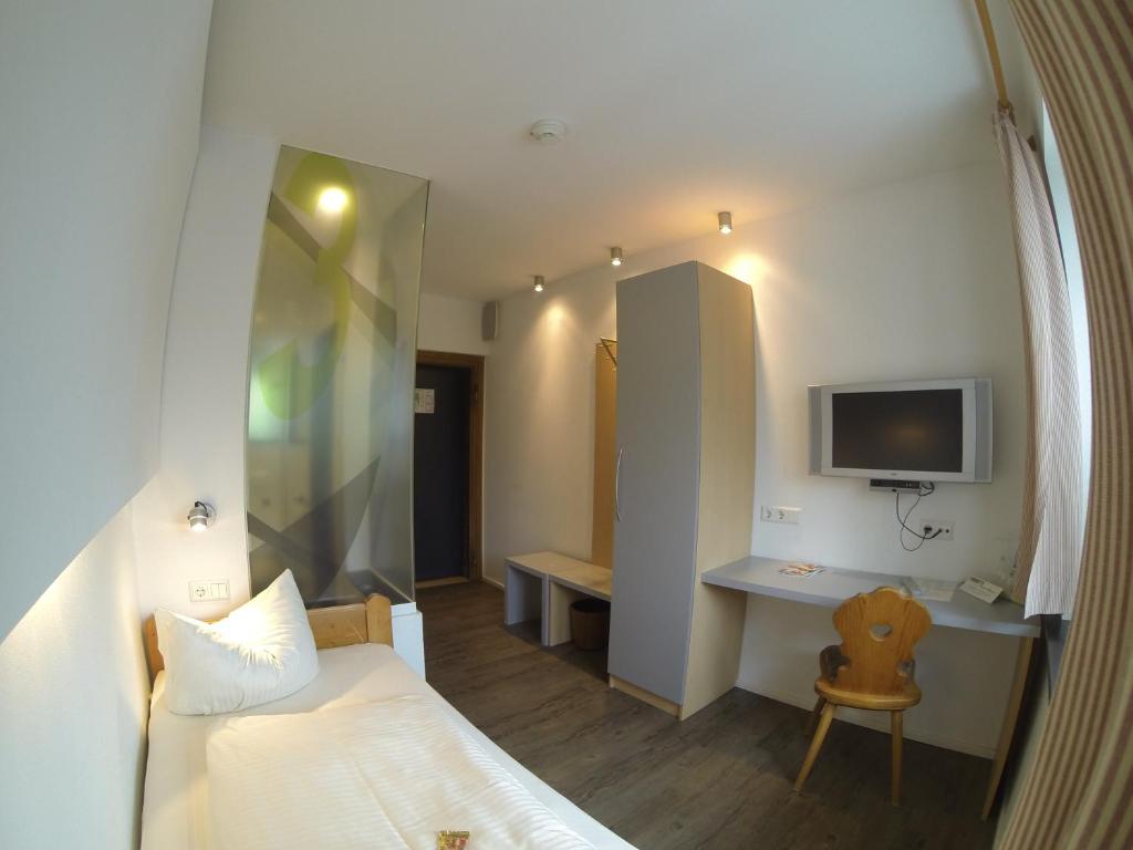 TV a/nebo společenská místnost v ubytování Hotel Landgasthof Koechlin