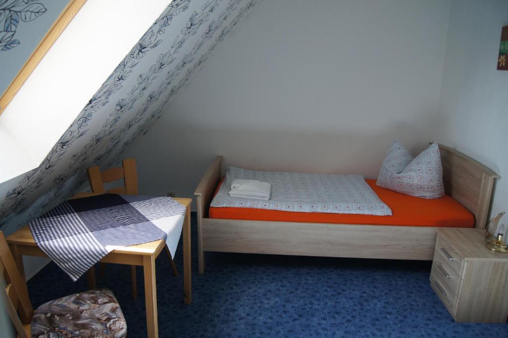 Postel nebo postele na pokoji v ubytování Hotel Draschwitz