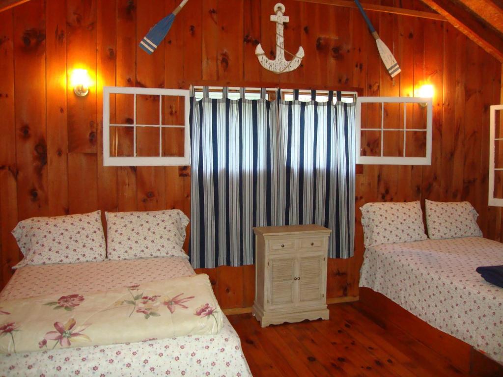 Postel nebo postele na pokoji v ubytování Paradise Resort Saratoga