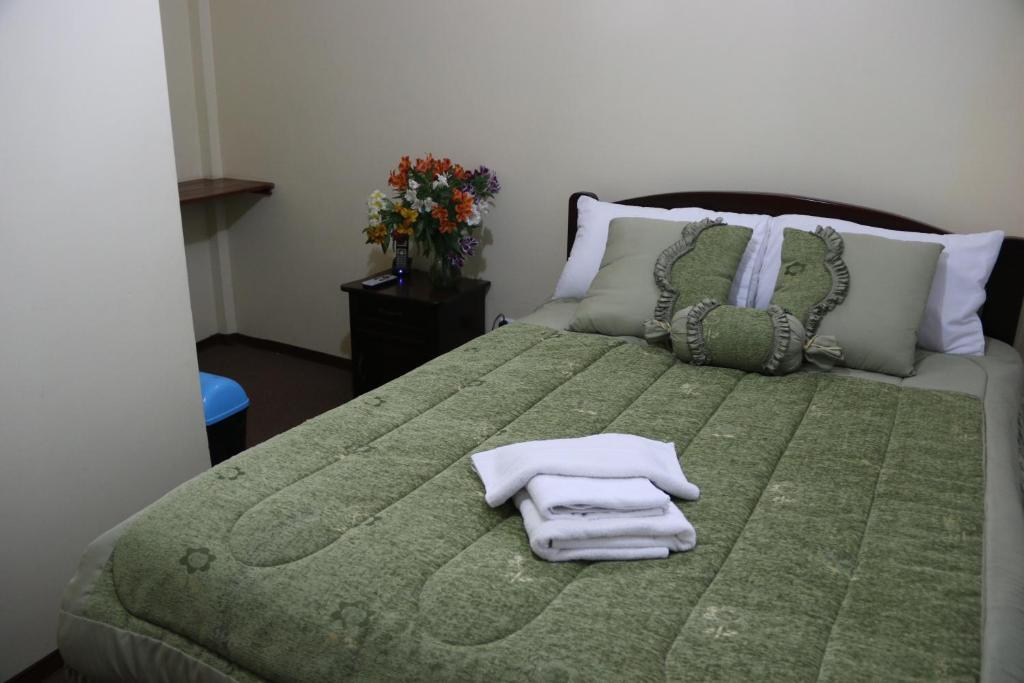 Postel nebo postele na pokoji v ubytování Hotel Residencial El Viajero