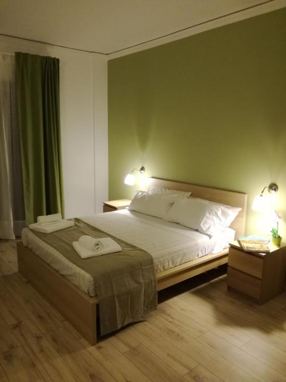 Postel nebo postele na pokoji v ubytování L'Alba sui Templi