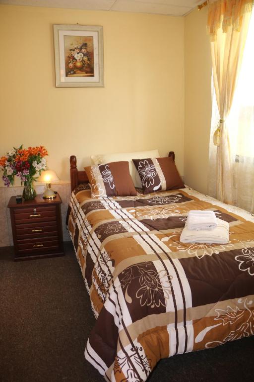 Postel nebo postele na pokoji v ubytování Hotel Residencial El Viajero