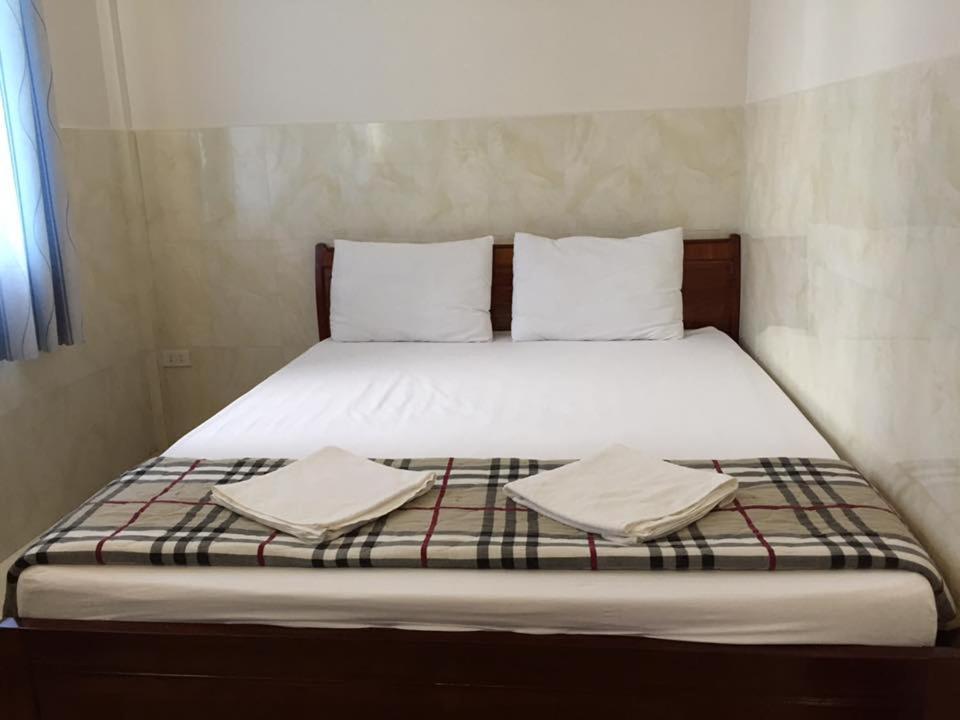 Postel nebo postele na pokoji v ubytování Gia Thanh Phu Quoc Guest House