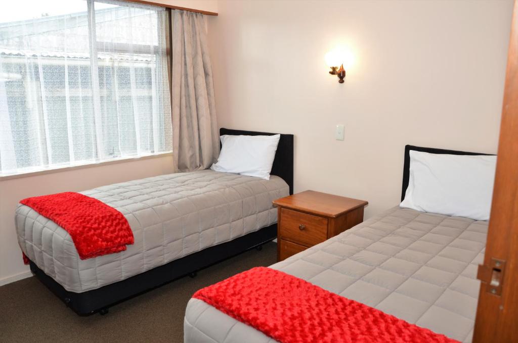 Postel nebo postele na pokoji v ubytování Esplanade Motels