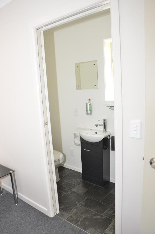 Koupelna v ubytování Esplanade Motels