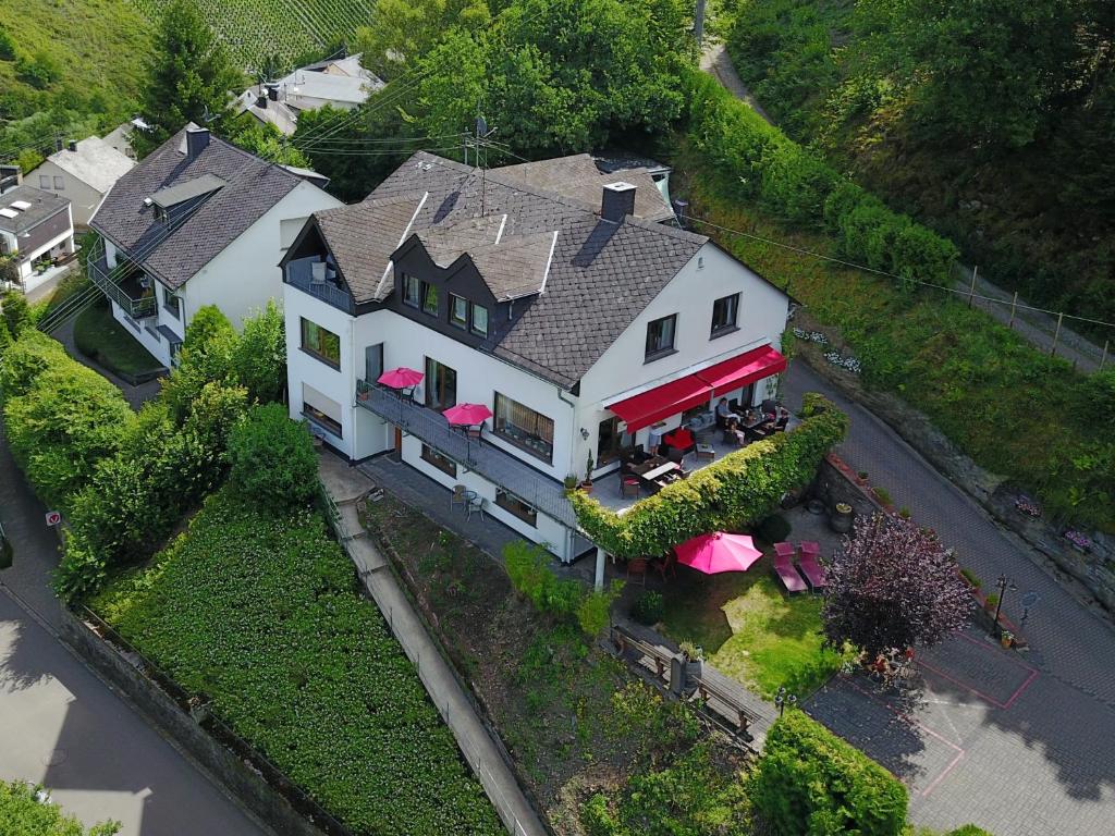 an overhead view of a large house with a train at Haus Grünewald in Zell an der Mosel