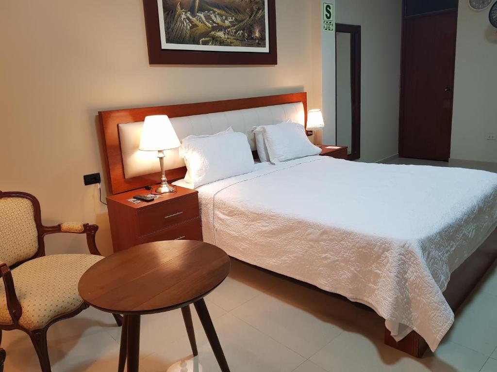 Кровать или кровати в номере Hotel San Antonio