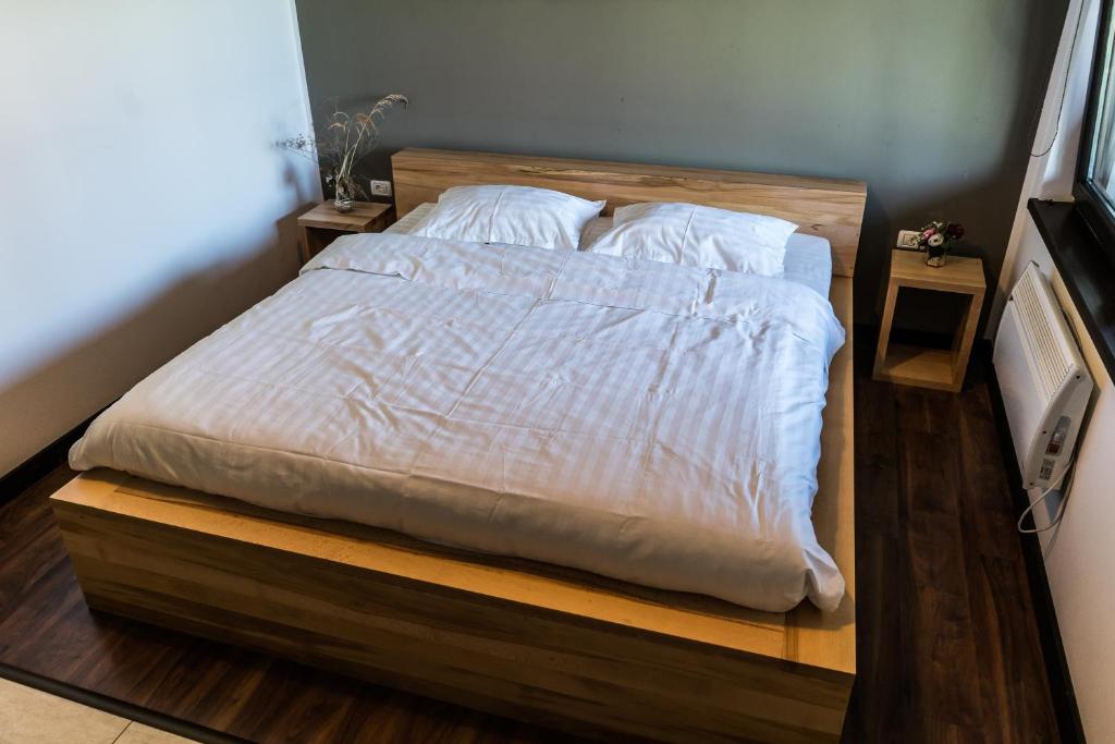 Postel nebo postele na pokoji v ubytování Casa Patru Anotimpuri