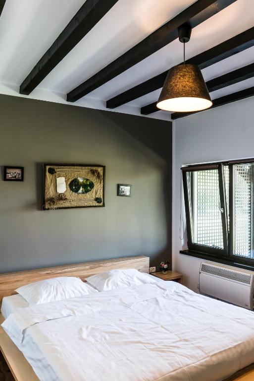 Postel nebo postele na pokoji v ubytování Casa Patru Anotimpuri