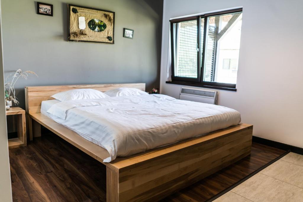 Postel nebo postele na pokoji v ubytování Casa Patru Anotimpuri