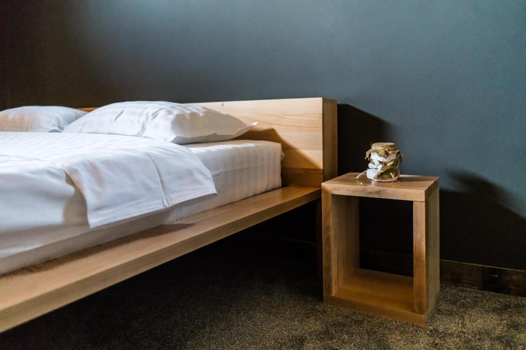 Postel nebo postele na pokoji v ubytování Casa Patru Anotimpuri