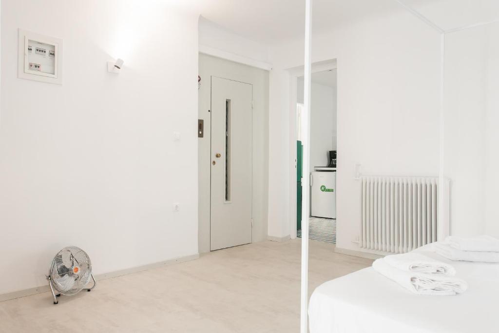 Posteľ alebo postele v izbe v ubytovaní Karitsi Place
